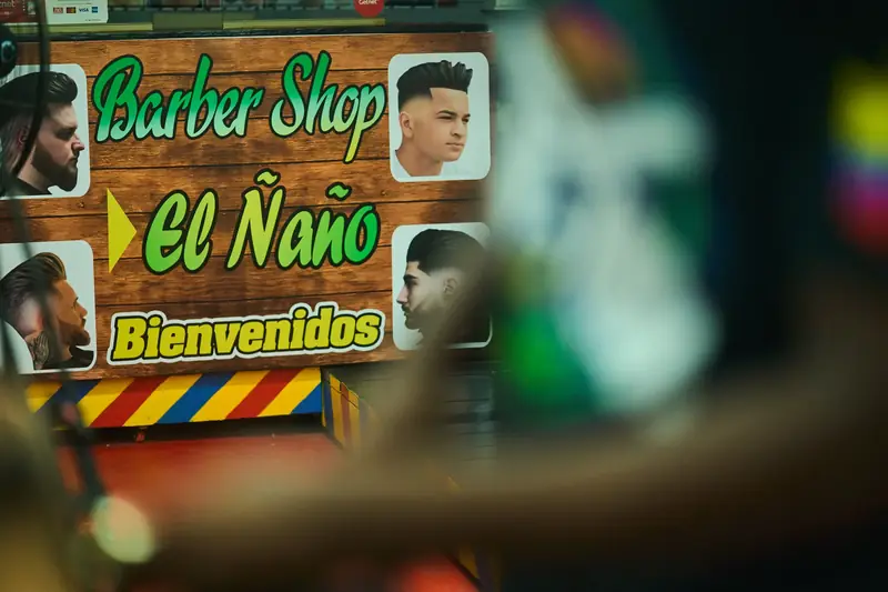 Letrero de bienvenida de Barber Shop El Ñaño